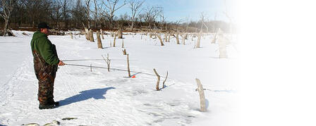 ANGLERS ENCOURAGED TO USE CAUTION ON ICE-COVERED LAKES ANGLERS ENCOURAGED TO USE CAUTION ON ICE-COVERED LAKES