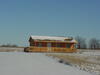 snow covered cabin pic